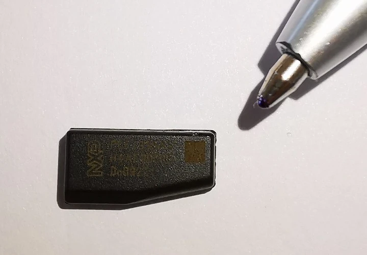 Why Electronics Fail — Typical Transponder for electronic keys showing size comparison