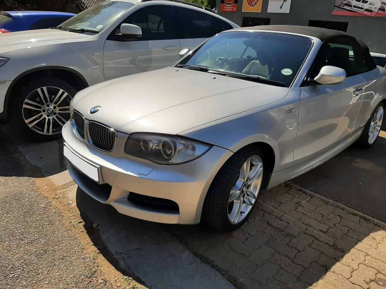 BMW 135i E88 N54 Convertible 2010 — Sold — BMW 135i E88 N54 2010 Convertible front angle view