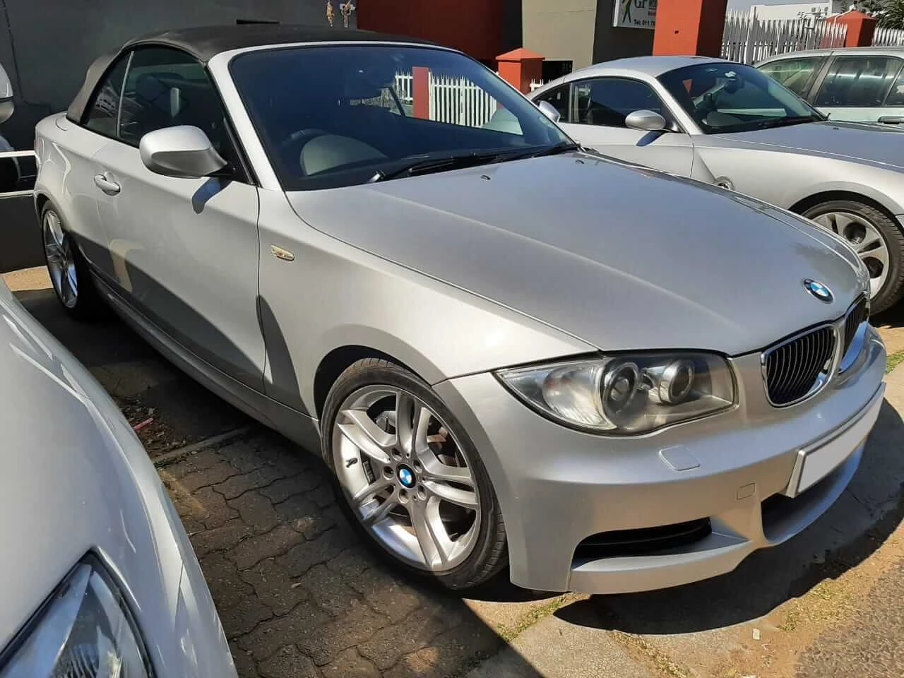 BMW 135i E88 N54 Convertible 2010 — Sold — BMW 135i E88 N54 2010 Convertible front right angle view