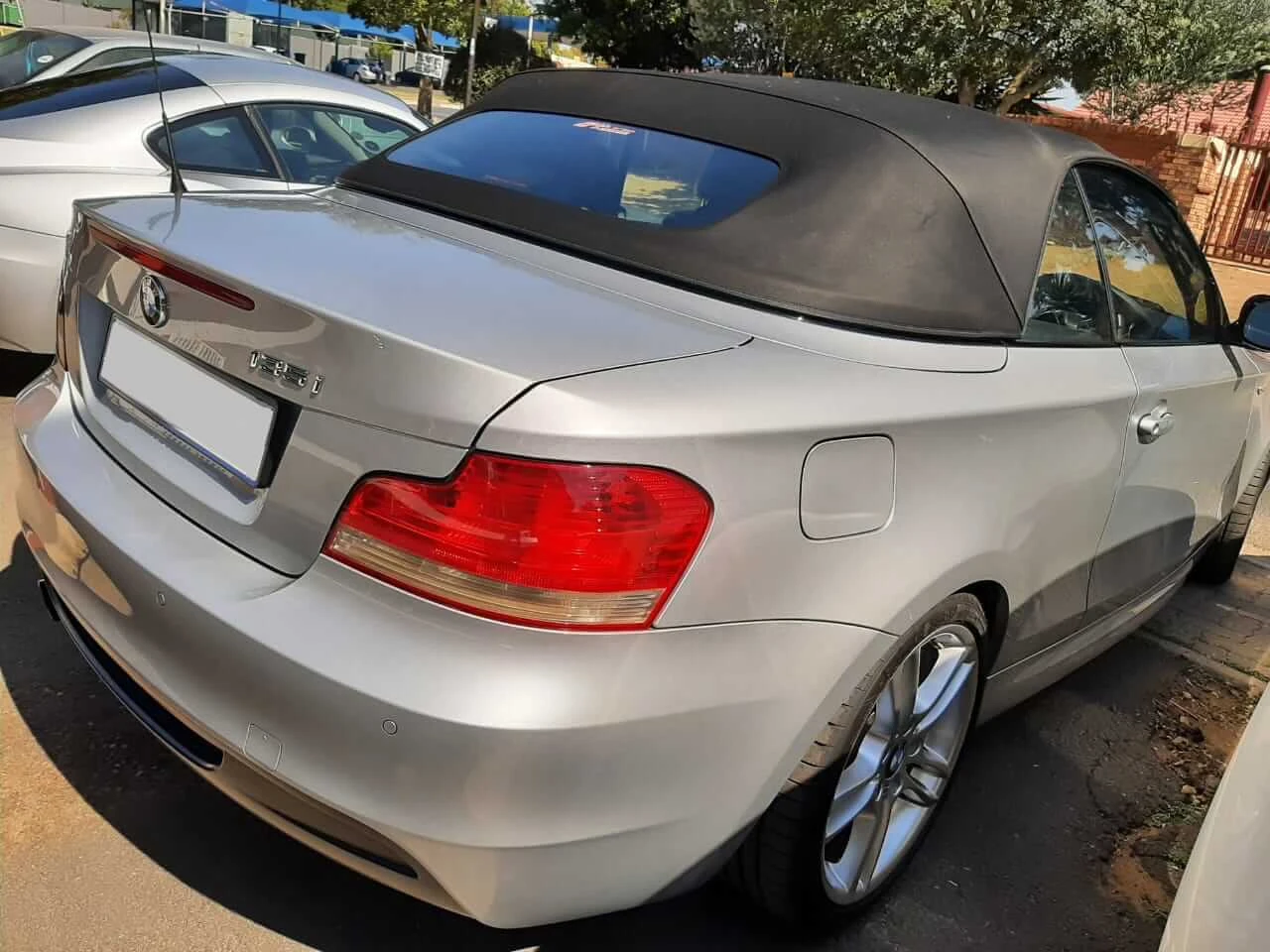 BMW 135i E88 N54 Convertible 2010 — Sold — BMW 135i E88 N54 2010 Convertible rear right angle view