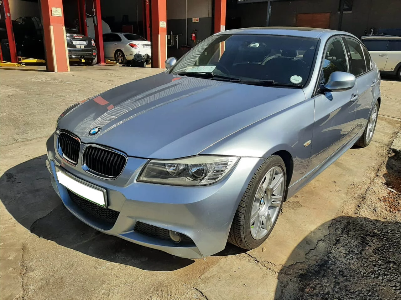 BMW 320d E90 2011 — Sold — BMW E90 320d front angle view