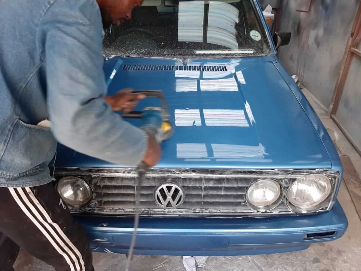 VW Golf Front-End Body Restoration — VW Golf bonnet buffed to gloss finish