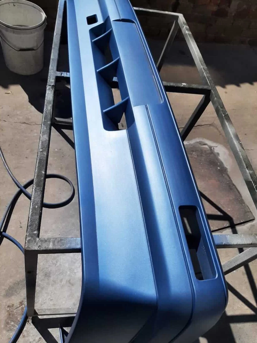 VW Golf Front-End Body Restoration — VW Golf bumper repaired and spray painted e1632143937889