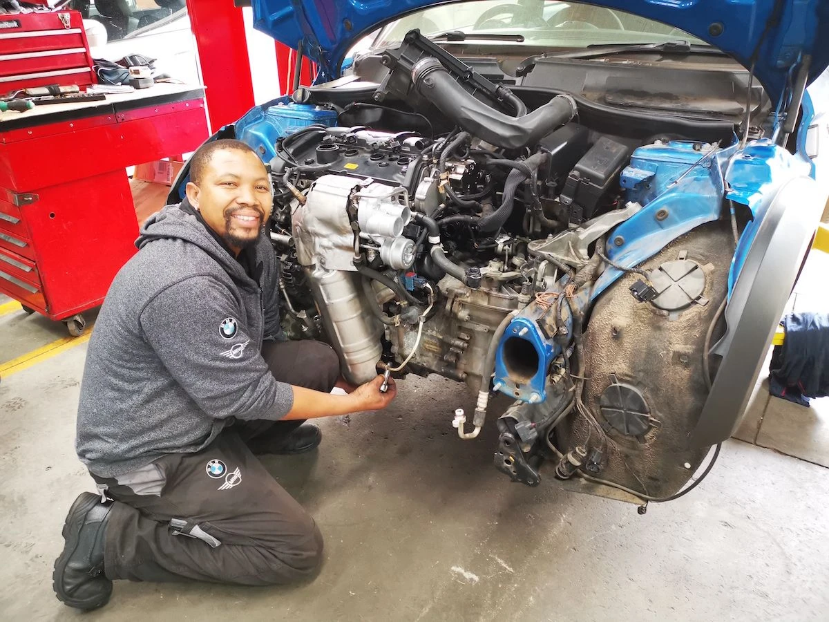 MINI Cooper S R56 Engine Replacement & Clutch & Turbo Recon — Mini Cooper S R56 Technician working on engine