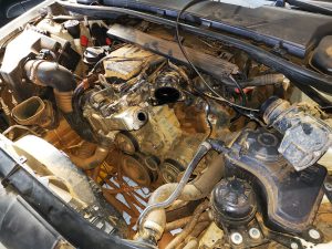 BMW 320d showing engine bay - alternator failure undergoing repair or replacement at GP Motor Works