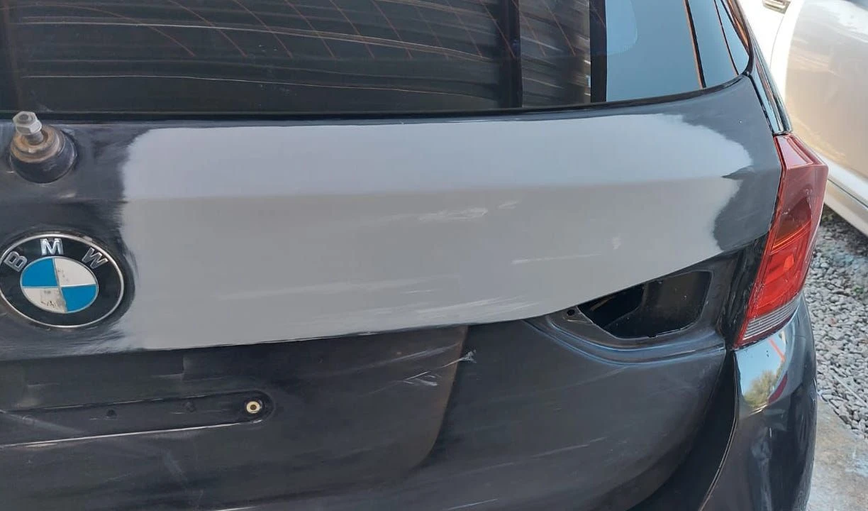 BMW X1 Interior, Body & Mechanical Restoration — BMW X1 e84 damaged tailgate repair