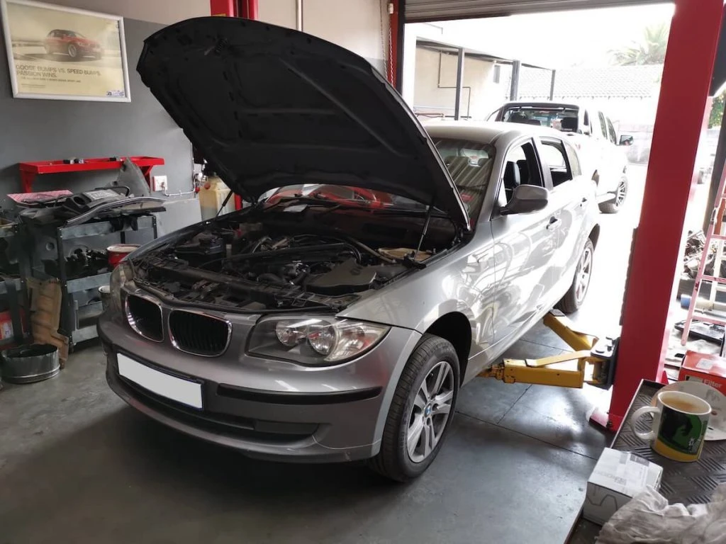 Oil and Coolant Leaks: Why Early Diagnosis Matters — BMW 118i water leaks front