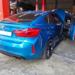 BMW X6M with air suspension problems being repaired at GP Motor works
