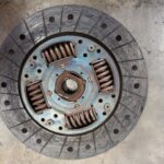 Old Hyundai i20 1.6 worn clutch with extensive damage at GP Motor Works