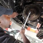 Hyundai i20 1.6 technician removing flywheel at GP Motor Works