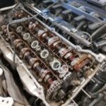 BMW Z4 engine with head removed in order to reset the timing and idling at GP Motor Works